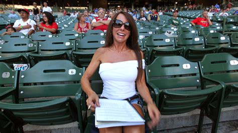 Front Row Amy is the center of attention at Brewers games.